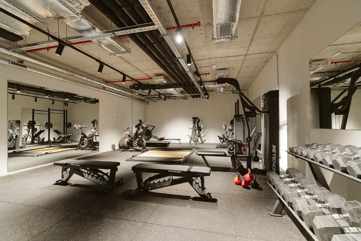 Gym for coliving and coworking residents at La Fabrica & Co in Barcelona
